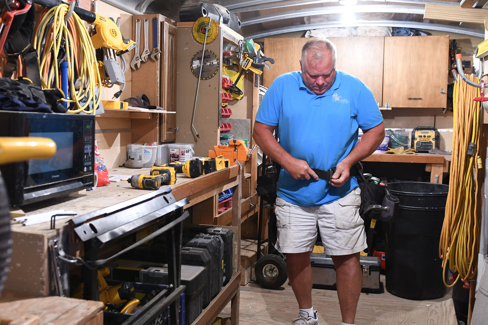 Marv Maassen puts on tool belt